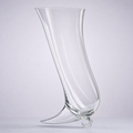 Horn decanter, a tapering crystal horn resting on a small curled glass foot