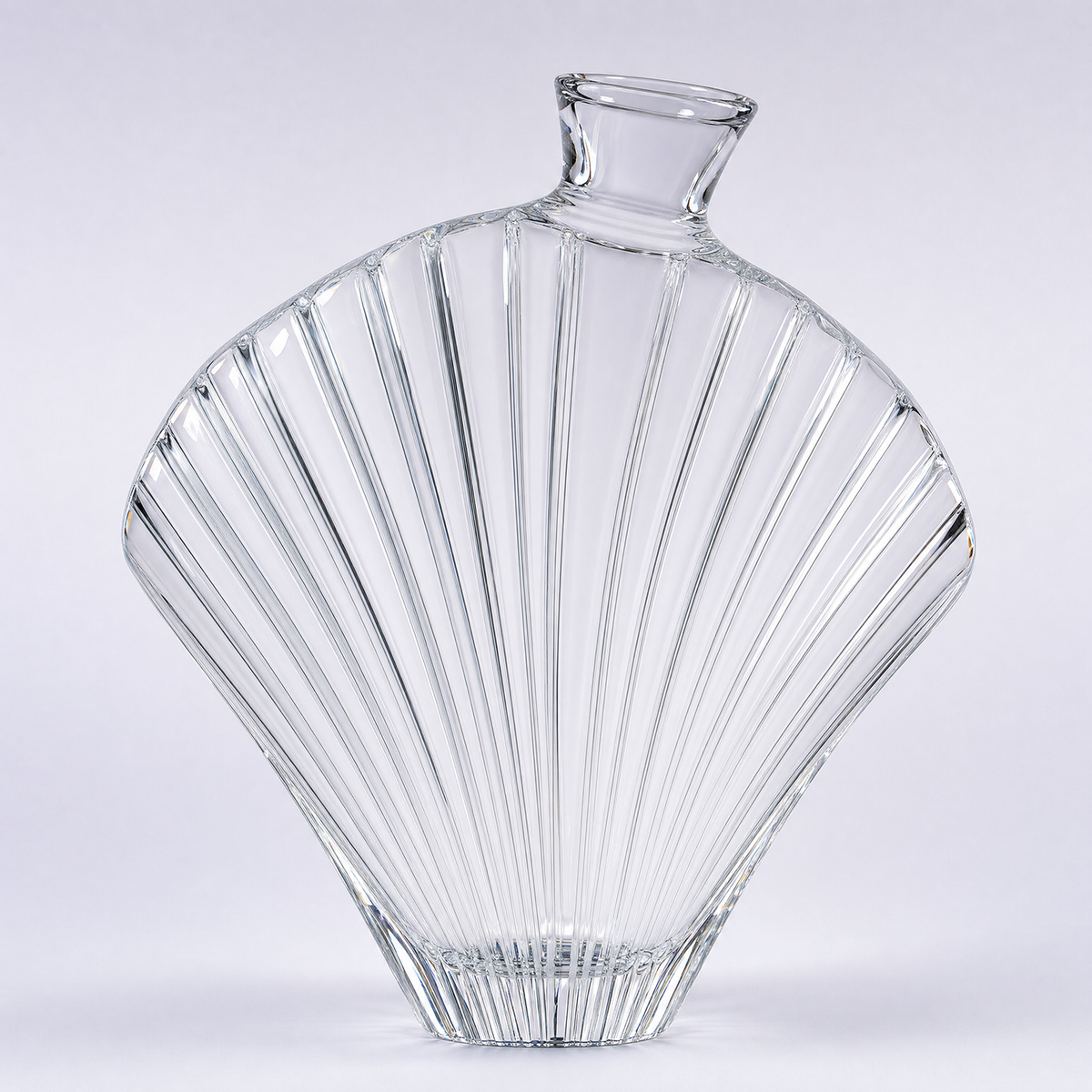 Shell decanter, a fan-shaped crystal body with deep optic ribs radiating from the base
