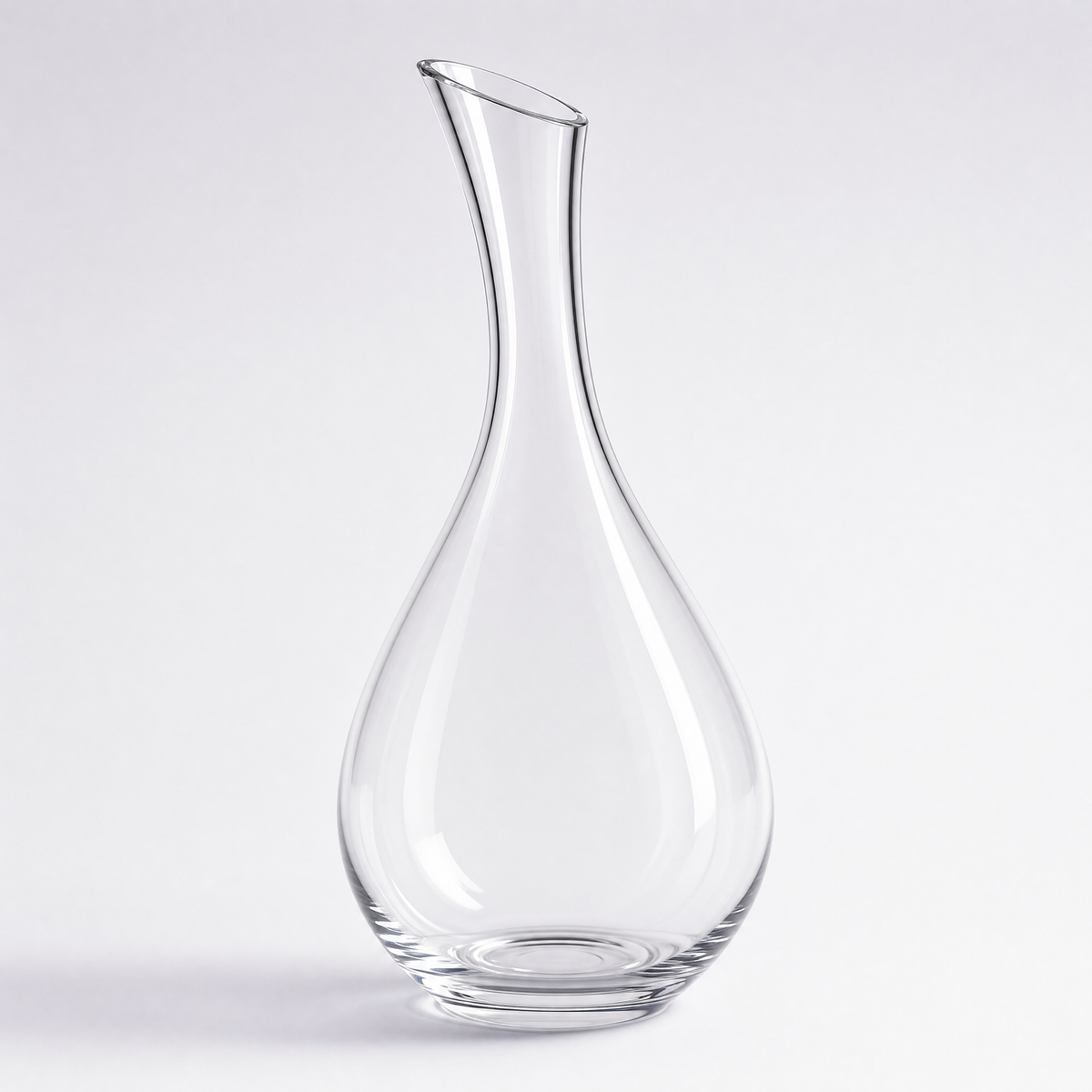 Aurora decanter, a crystal teardrop body with a long slender neck and angled lip