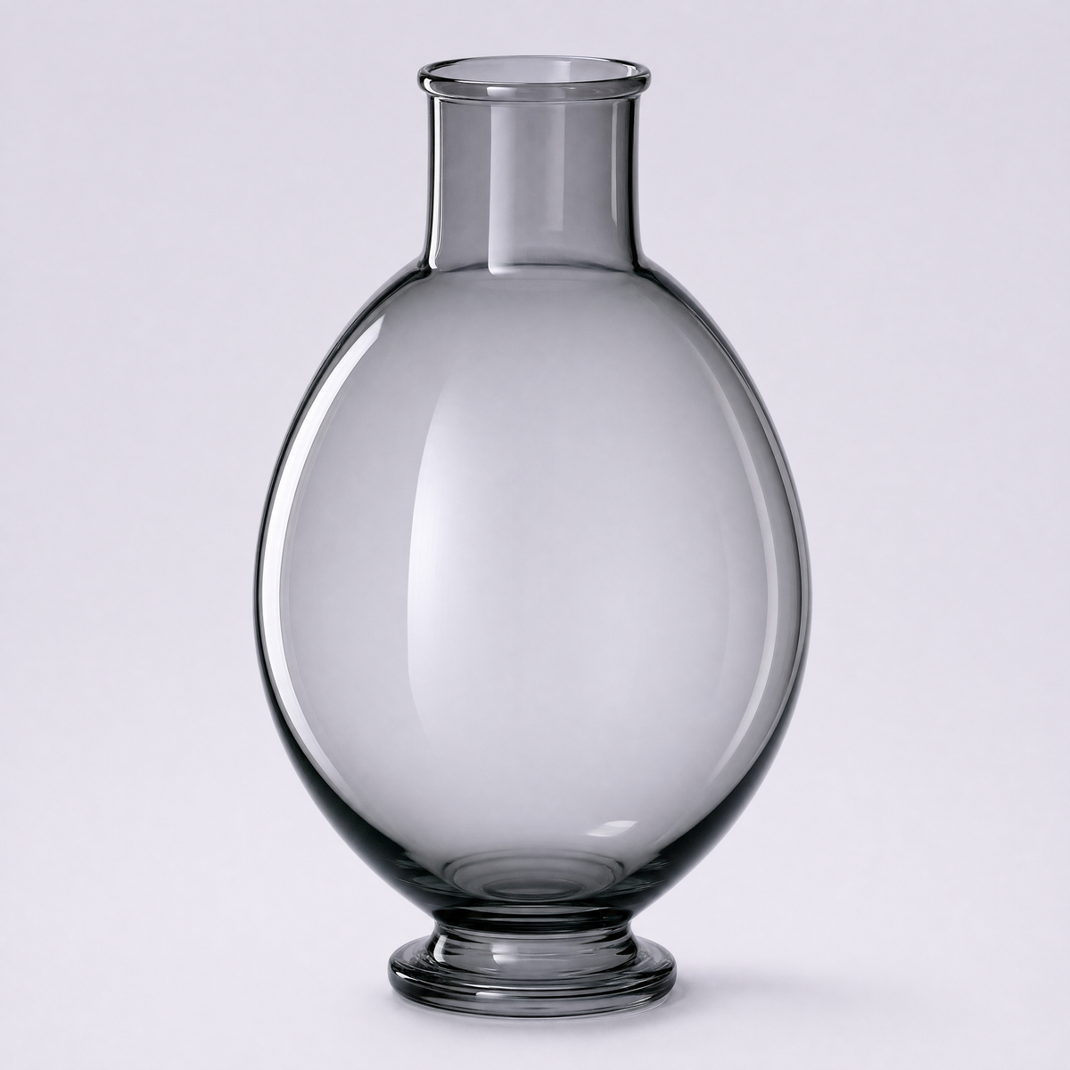 Onyx decanter, a smoke-grey crystal egg-shaped body on a low foot